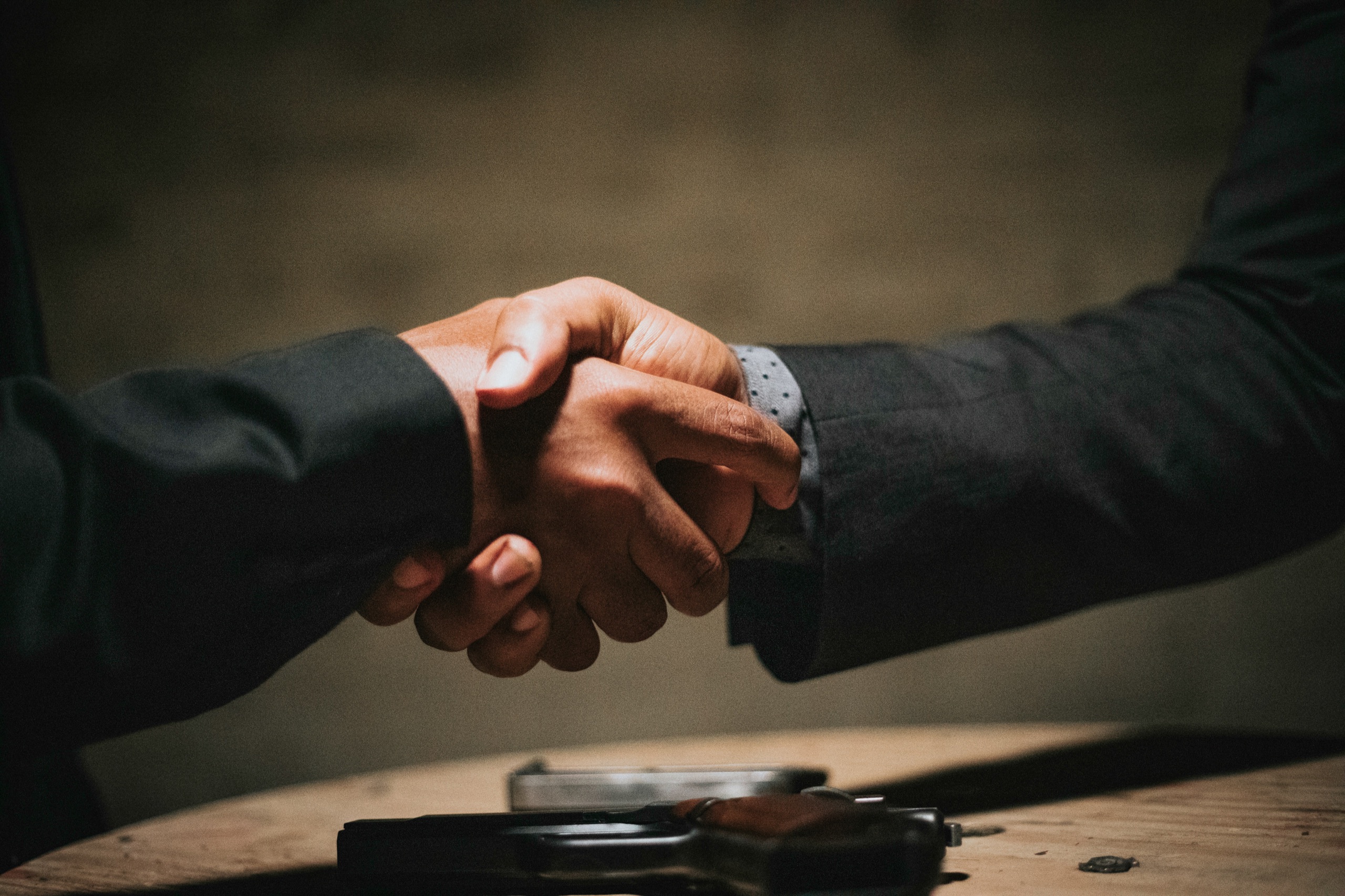 Handshake symbolizing agreement and trusted cooperation